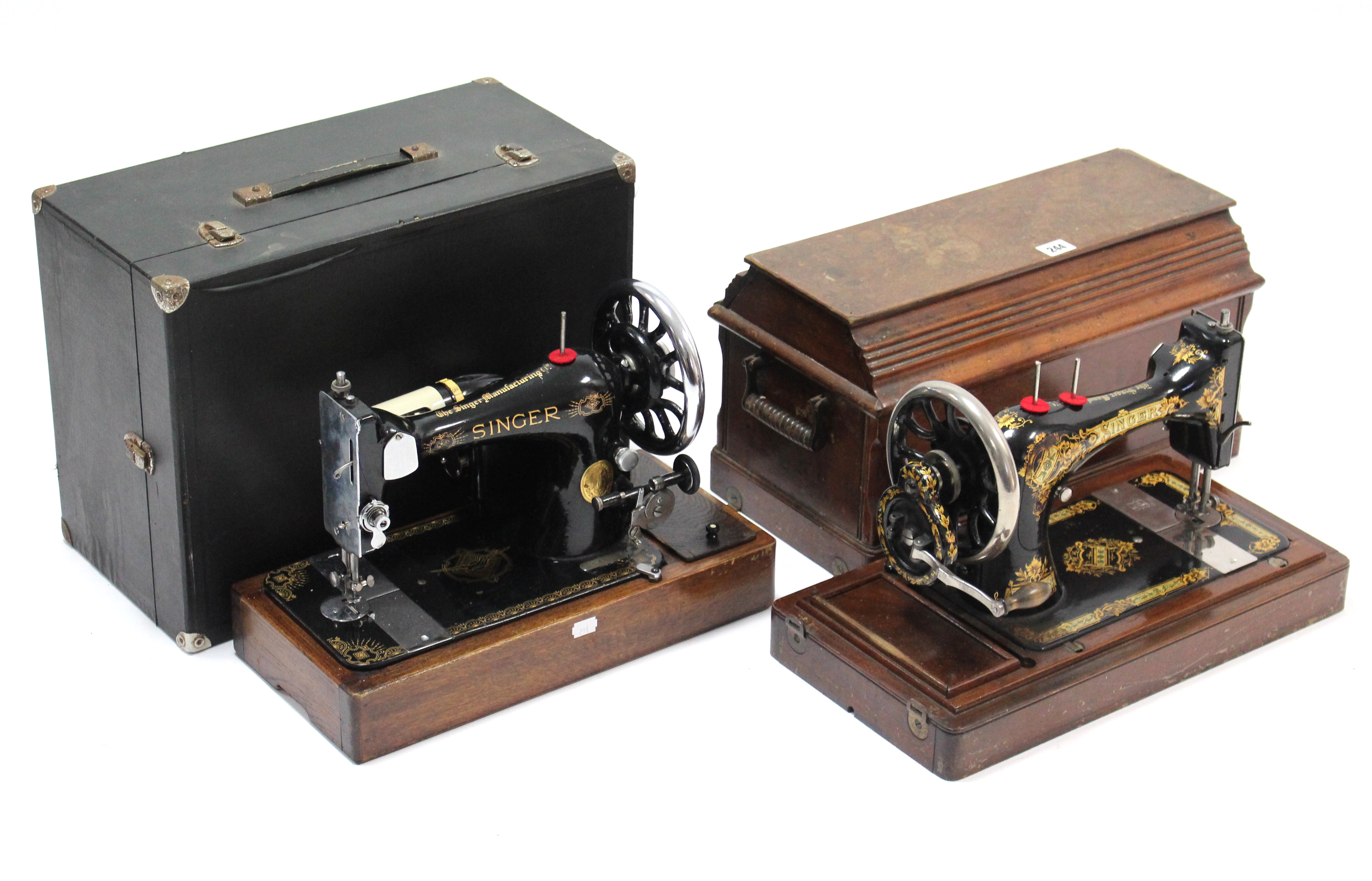 A Singer hand-sewing machine; & a ditto electric sewing machine, each with case.