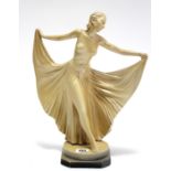 An Art Deco-style plaster ornament in the form of a standing female dancer, (slight faults), 14½”