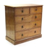 A VICTORIAN ASH CHEST, fitted two short & three long graduated drawers with brass drop handles, & on