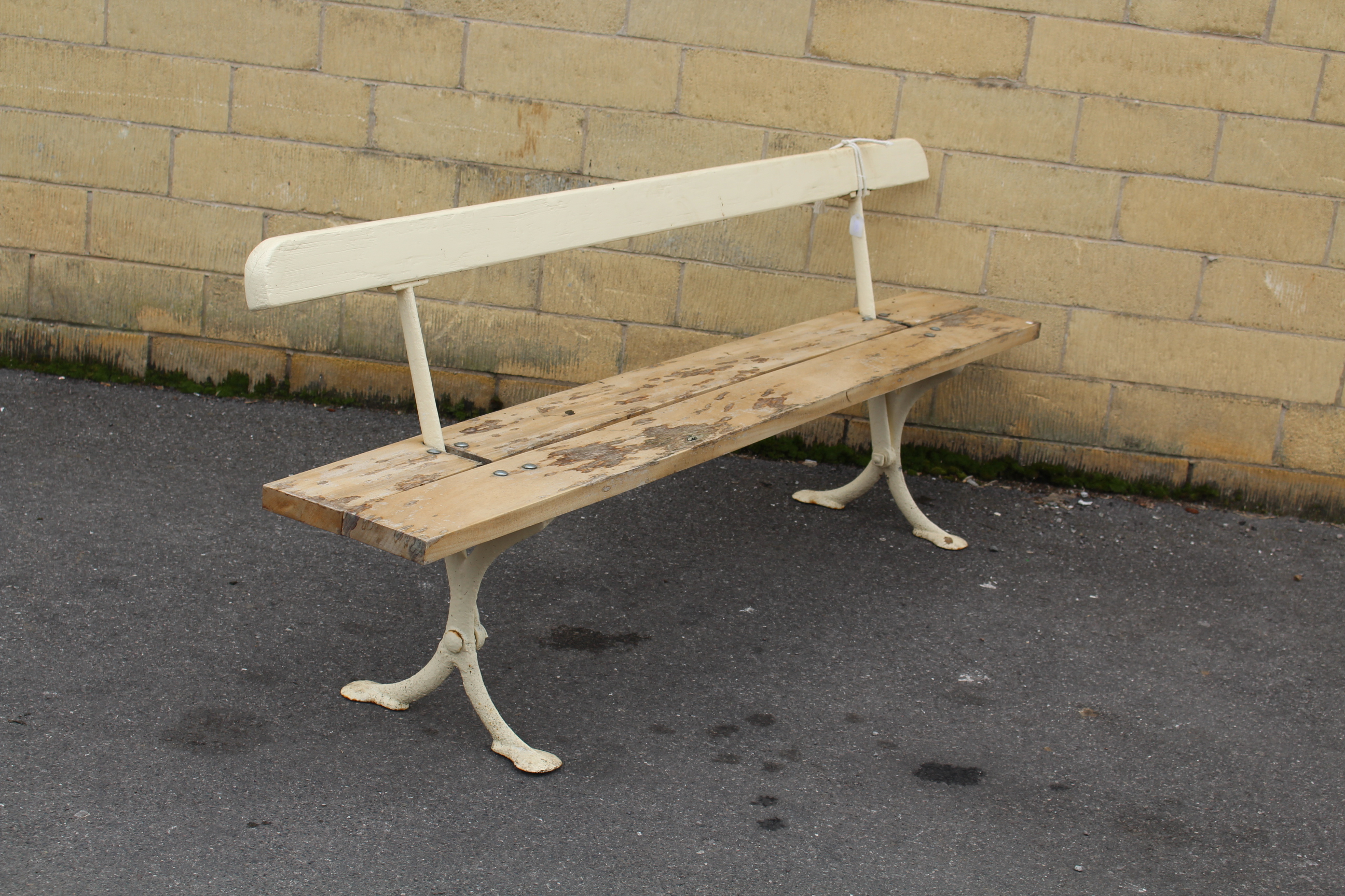 An early/mid-20th century white painted wooden & cast-iron tram bench on X-shaped end supports, 78¾” - Image 2 of 2