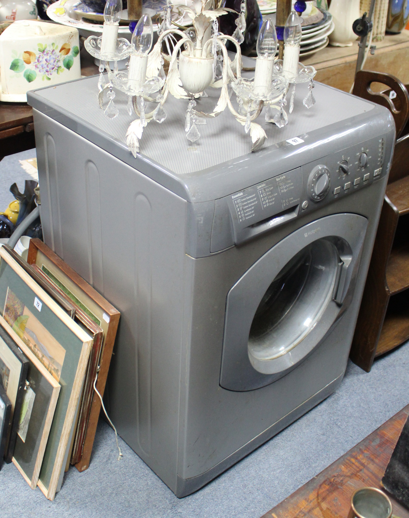 A Hotpoint 8kg washing machine in silvered-finish case.