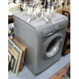 A Hotpoint 8kg washing machine in silvered-finish case.