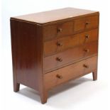 A mid-20th century small light oak chest, fitted two short & three long graduated drawers with