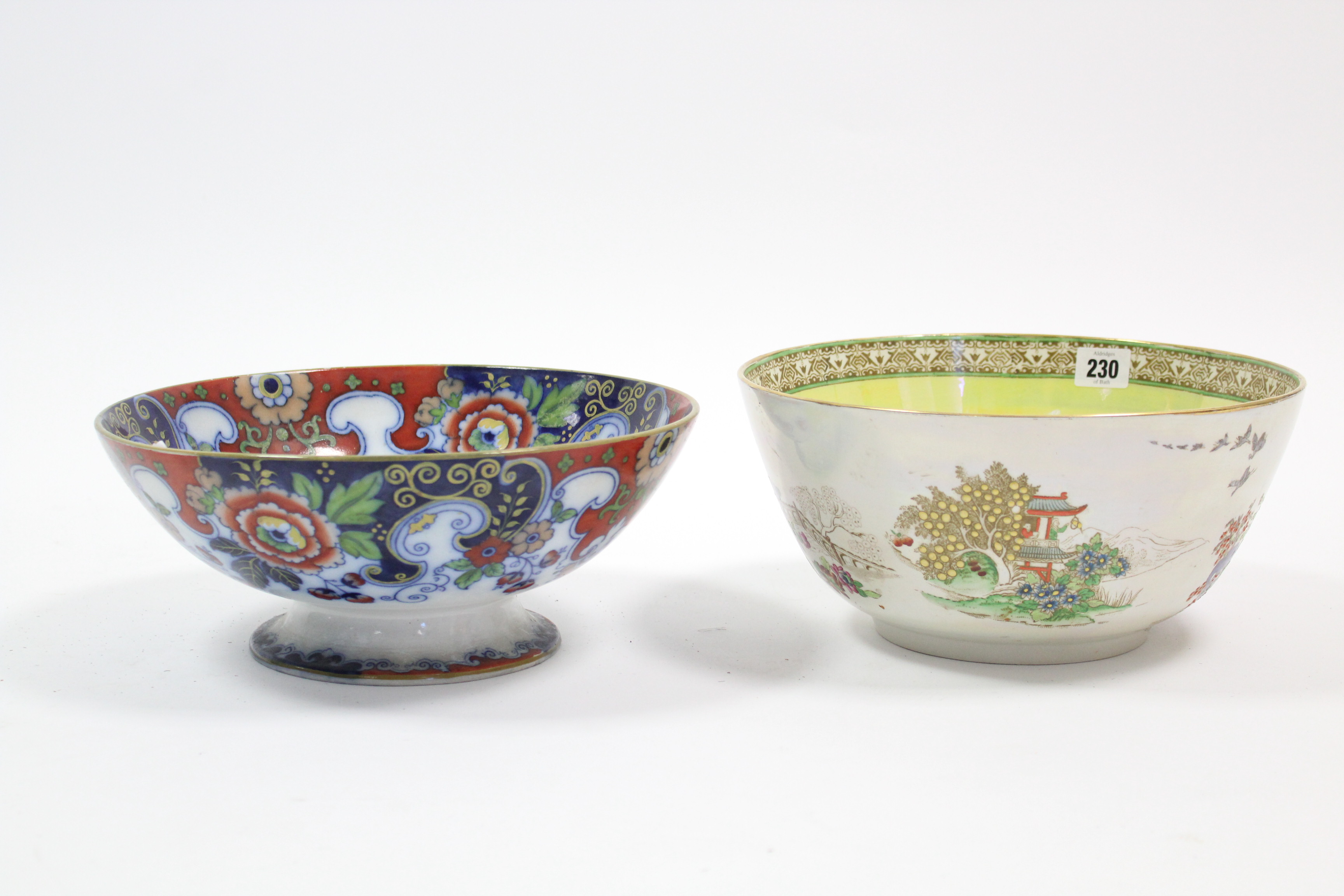 A deep circular fruit bowl with oriental garden landscape to the exterior, & with yellow