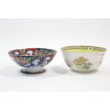 A deep circular fruit bowl with oriental garden landscape to the exterior, & with yellow