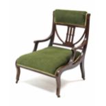 An Edwardian inlaid-mahogany nursing chair, with padded back & sprung seat upholstered green velour,