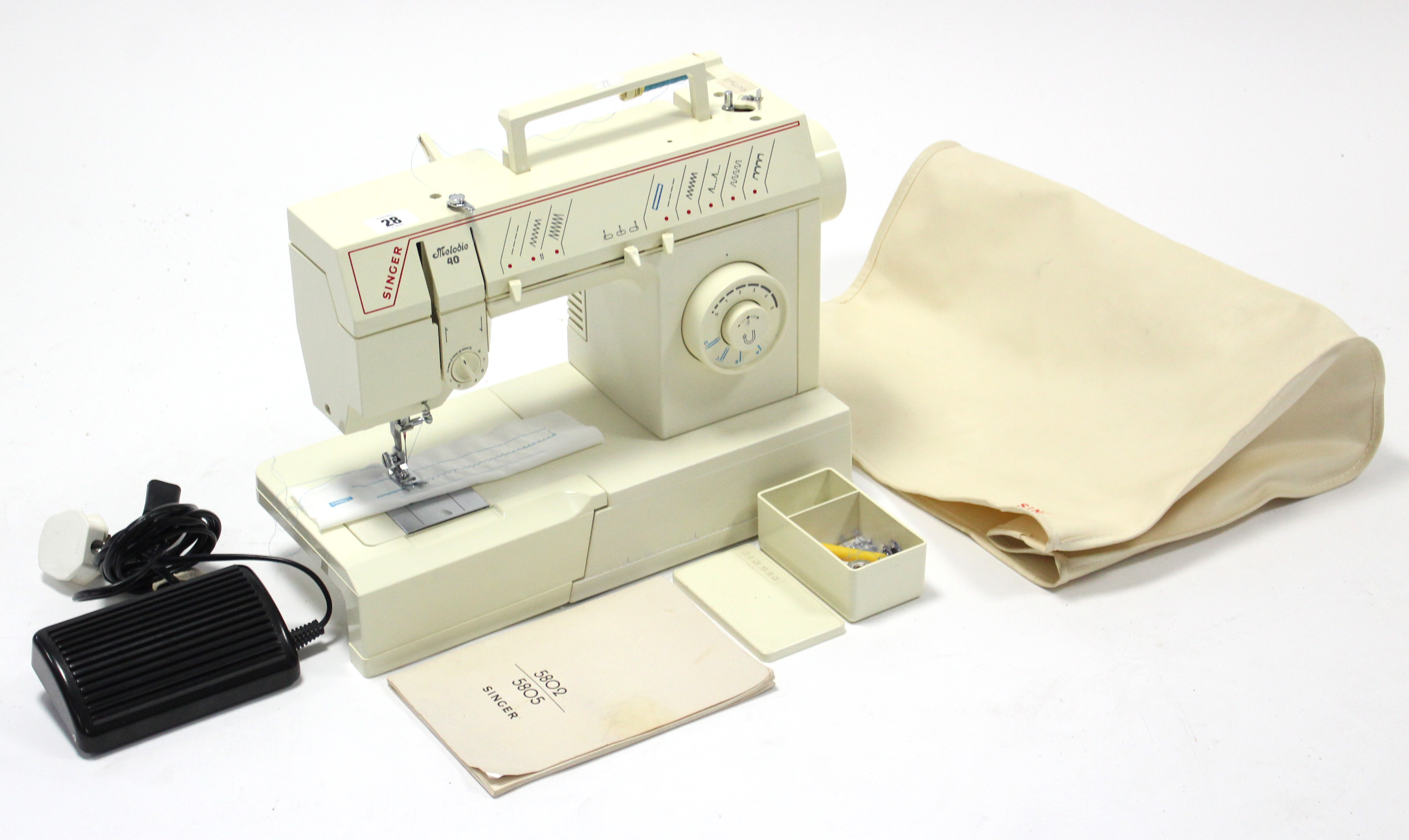 A Singer Melodie “40” electric sewing machine.