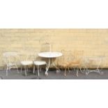 Five white painted wrought-iron patio chairs; & three similar garden tables.