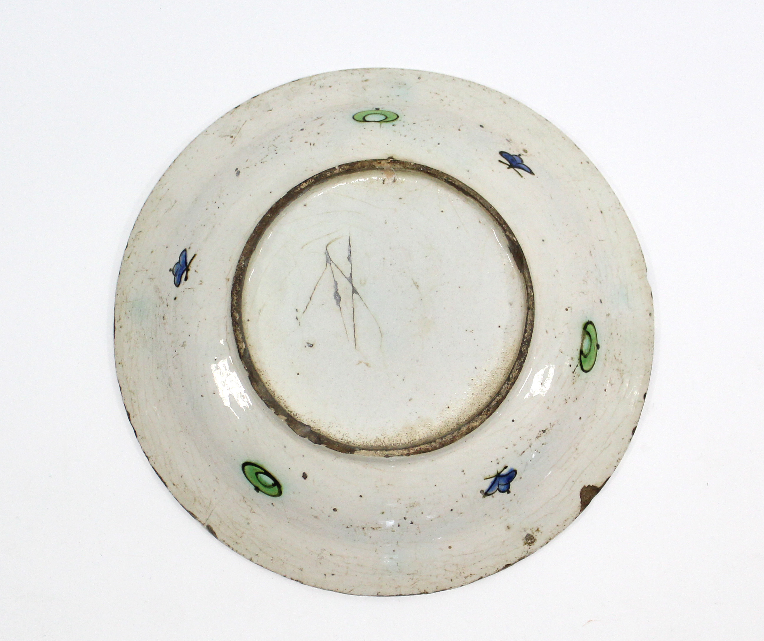 A 17th century IZNIK POTTERY SHALLOW DISH with polychrome painted stylised floral decoration - Image 5 of 6