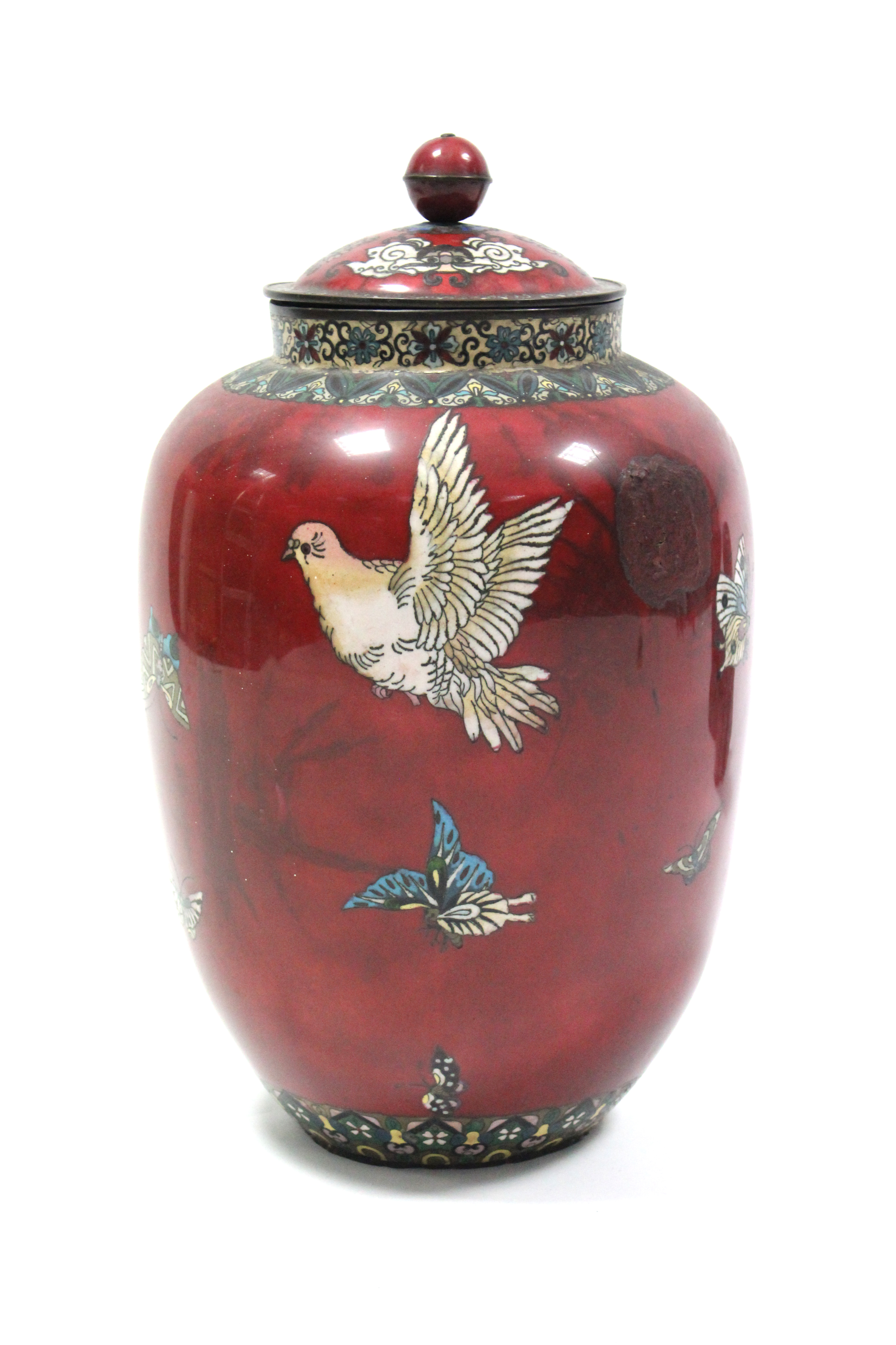 A Japanese cloisonné large ovoid vase & cover of red ground, decorated with birds & butterflies, 20”