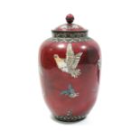 A Japanese cloisonné large ovoid vase & cover of red ground, decorated with birds & butterflies, 20”