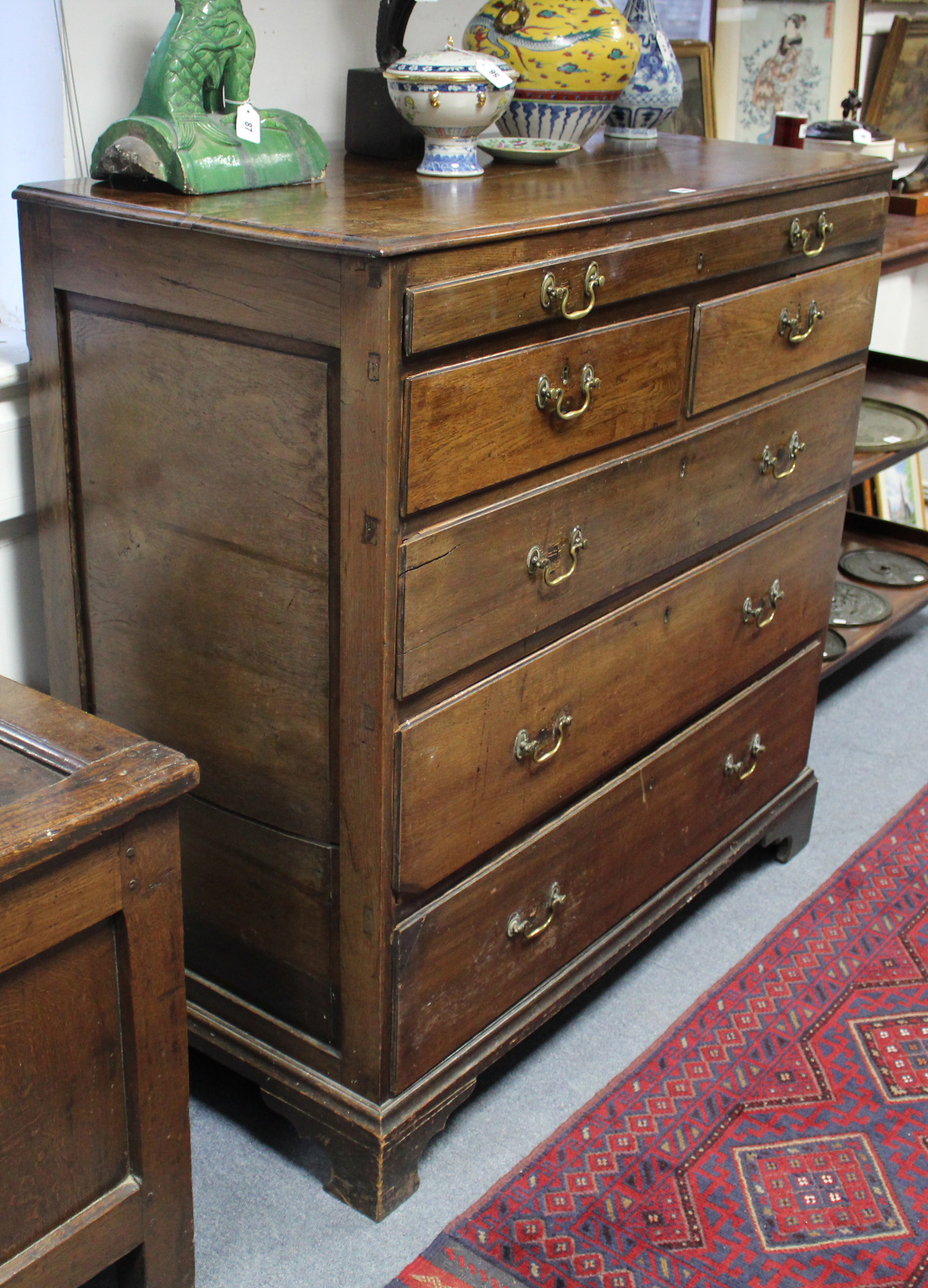 An early 18th century large oak chest, fitted full-width shallow drawer above two short - Image 2 of 3