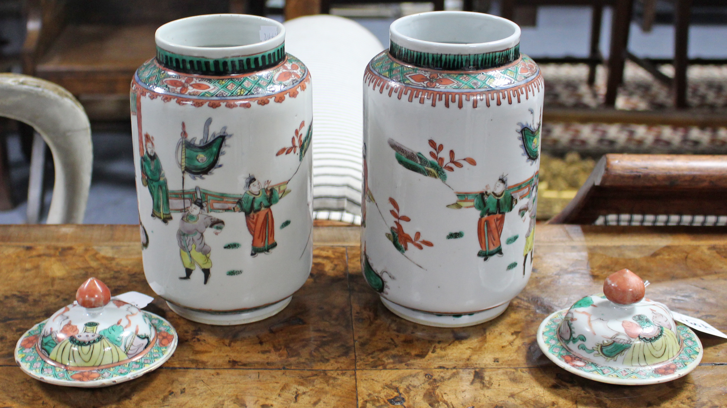 A pair of Chinese porcelain famille verte jars & covers, decorated with courtly figure scenes in the - Image 2 of 4
