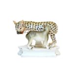 A 19th century ENGLISH PORCELAIN GROUP OF A LEOPARD & A DOG, each naturalistically coloured, the dog