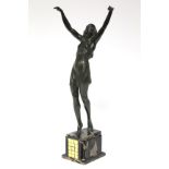 PIERRE Le FAGUAYS (attributed to). A bronze standing figure of a female gymnast, her arms raised