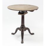A late 18th century mahogany tripod table, the circular top with raised edge & birdcage support,