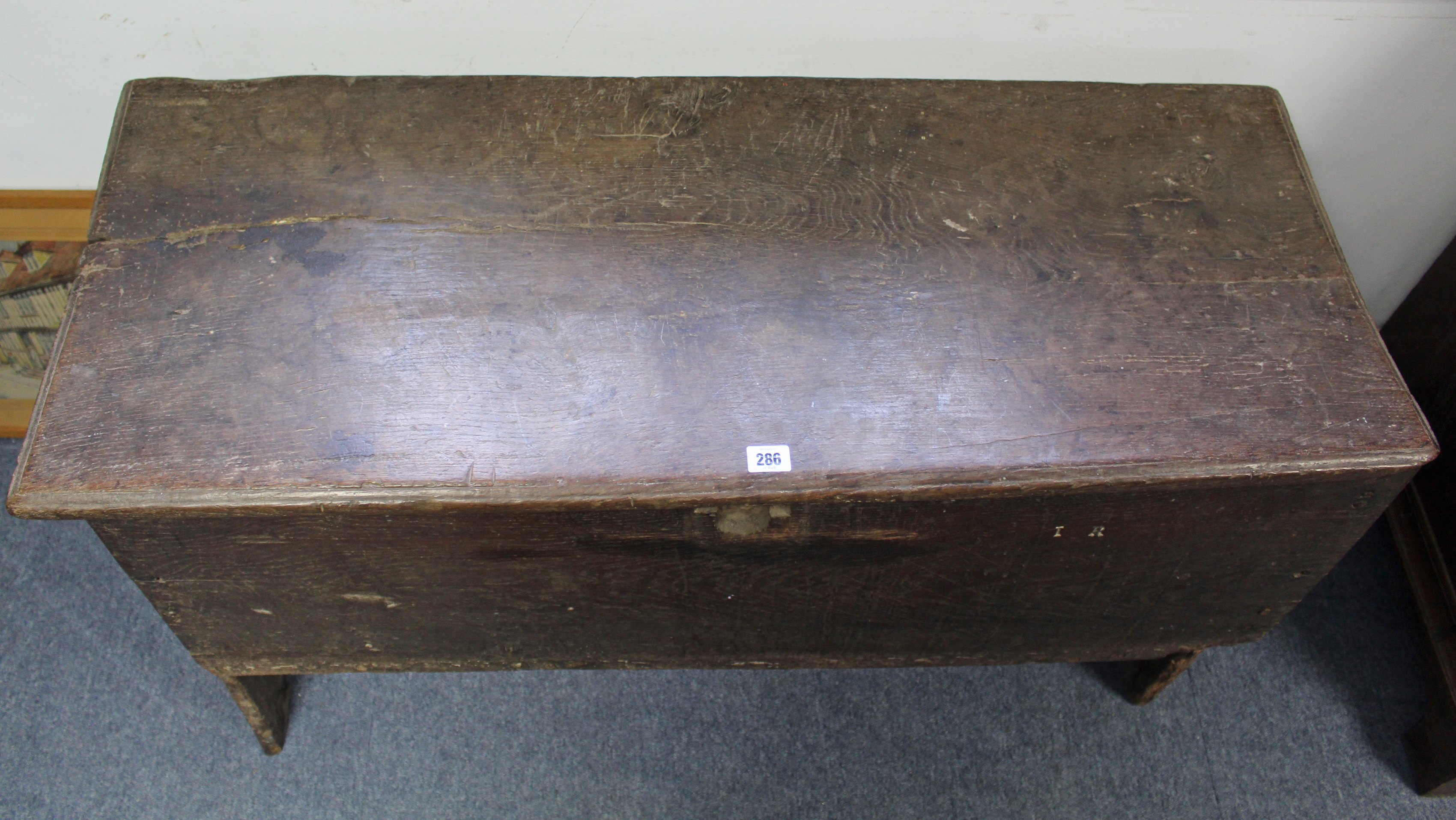 An early 18th century elm coffer of six-plank construction, the lift-lid with moulded edge; 43” wide - Image 4 of 5