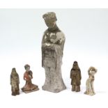 An early Chinese pottery standing male tomb figure dressed in long robes & with hands clasped,