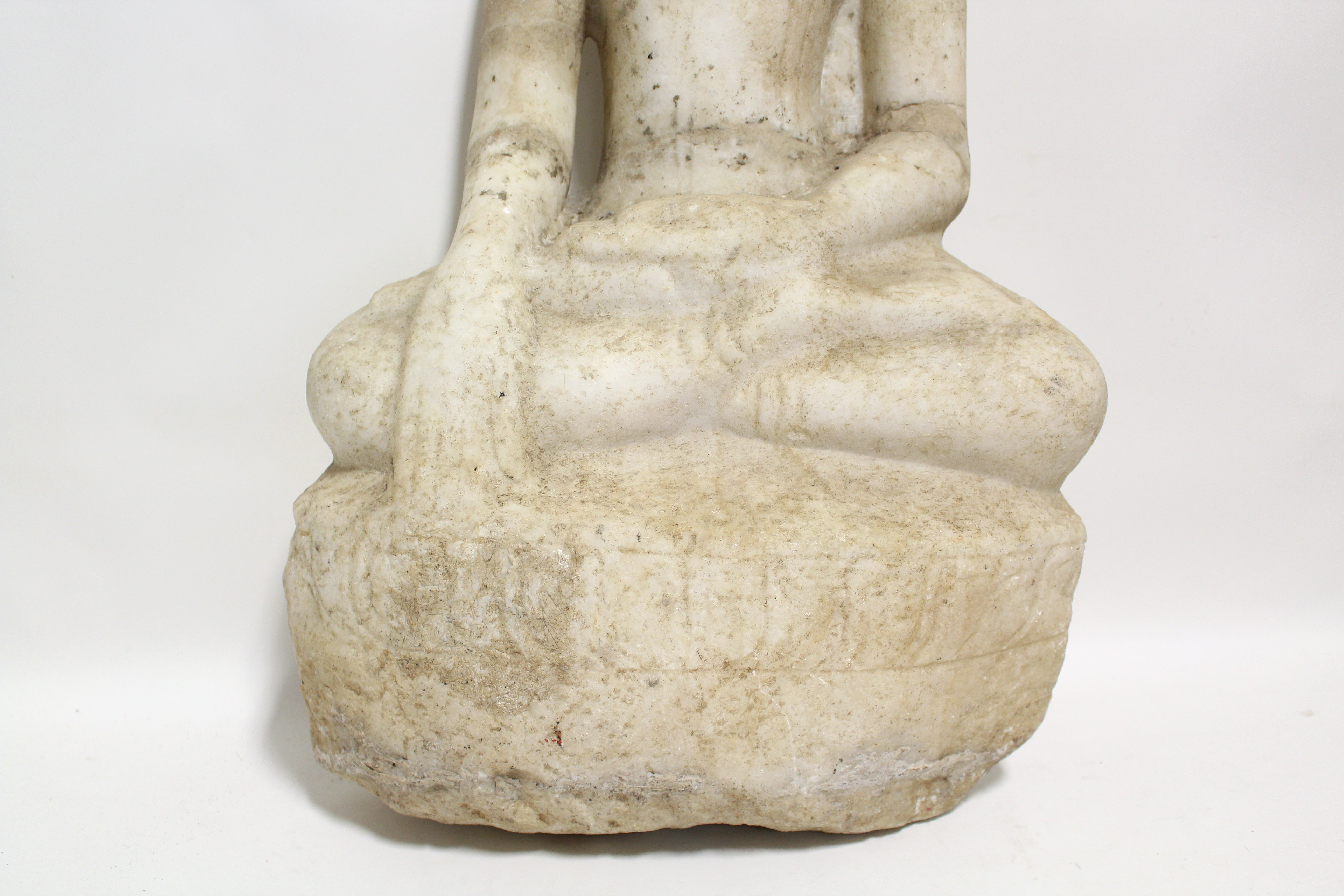 An Indian large sculptured white marble seated figure of the Buddha, 24¾” high (broken & re-stuck at - Image 4 of 4