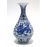 A Chinese blue & white porcelain octagonal baluster vase, decorated with lion-dogs & auspicious