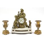 A 19th century French mantel clock with 3½” diam. convex enamel dial, in gilt brass case designed as