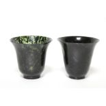 A pair of spinach-green jade beakers with flared rims, each on narrow ring foot; 2¾” high x 3”