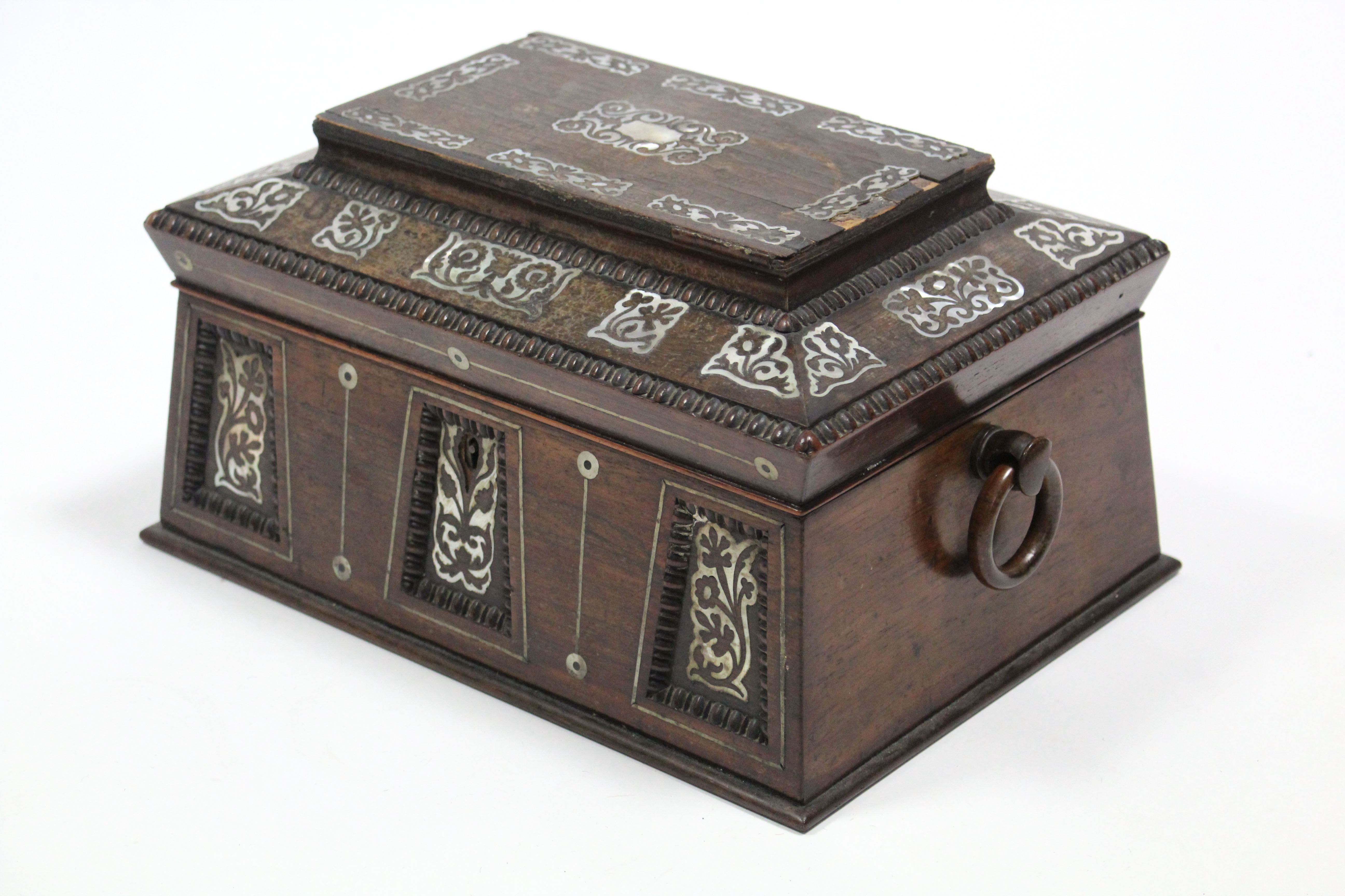 A 19th century mother-of-pearl inlaid work box of rectangular tapered form, with egg-&-dart