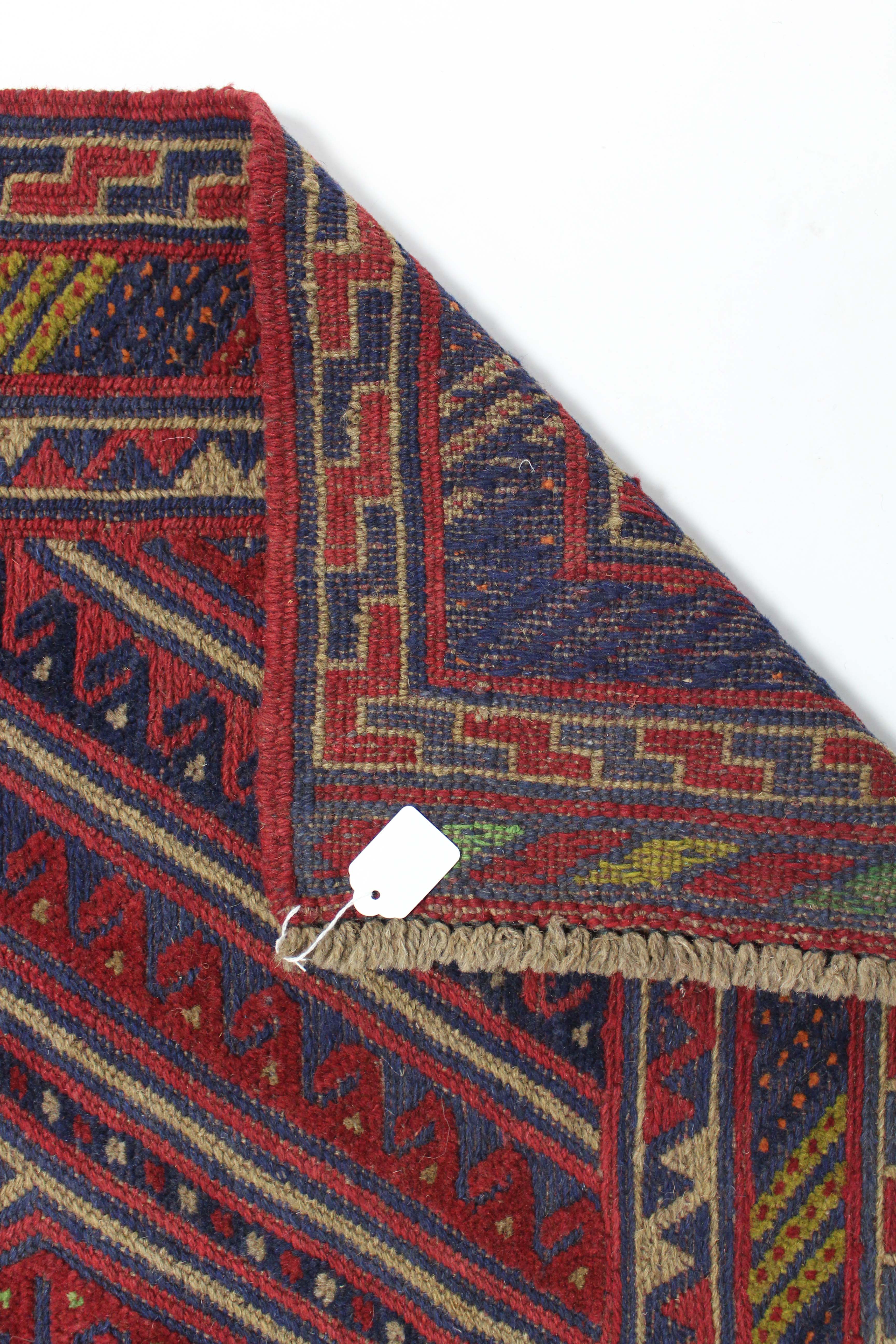 A Kazak rug of crimson & blue ground with central lozenge & hook design within multiple geometric - Image 2 of 2