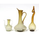 An amber-tinted glass vase with rounded body & tall slender “swan” neck, 12”; & two similar ewers,