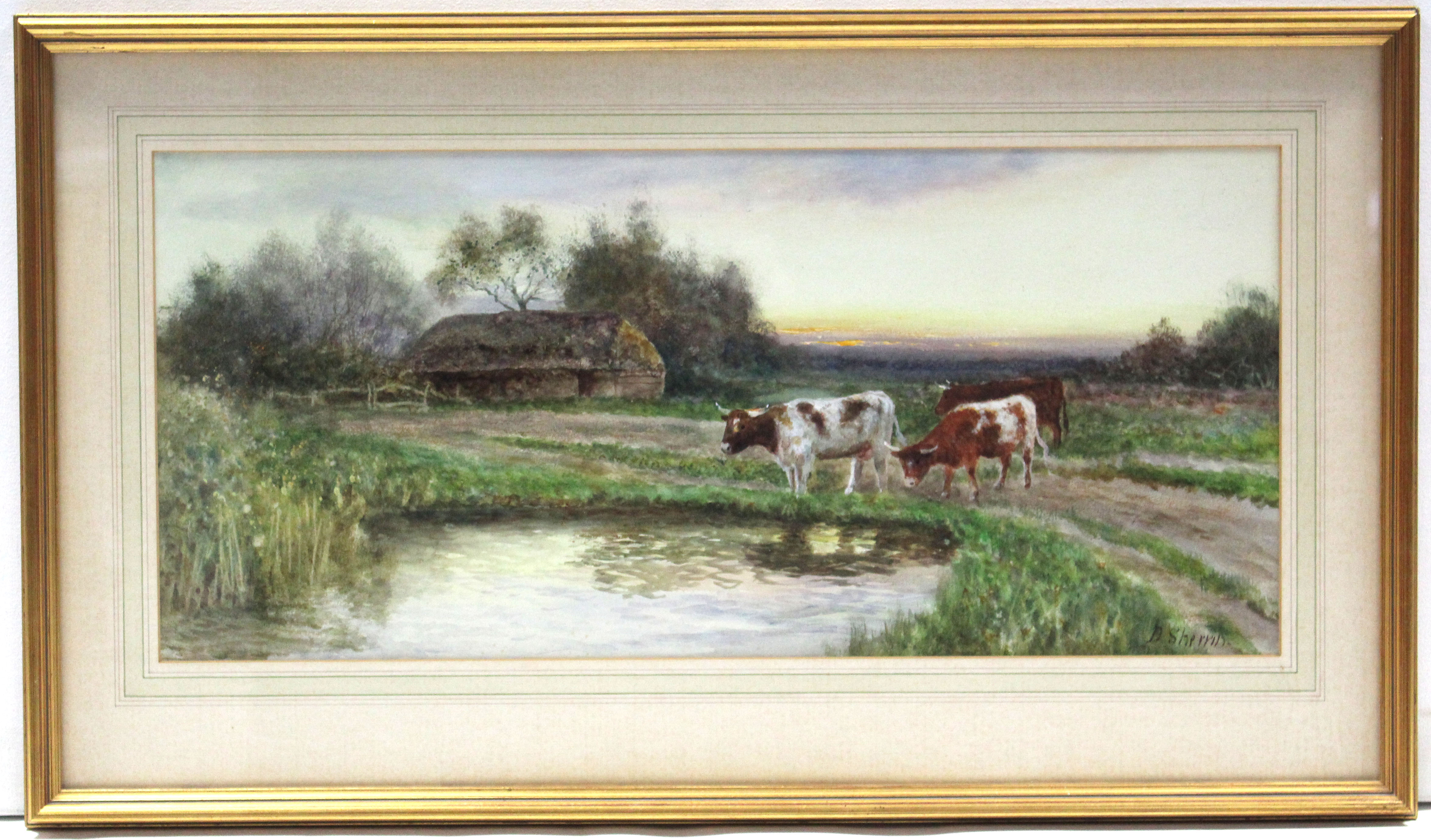 DANIEL SHERRIN (1868-1940). A rural landscape with cattle beside a pond, a farm building & trees