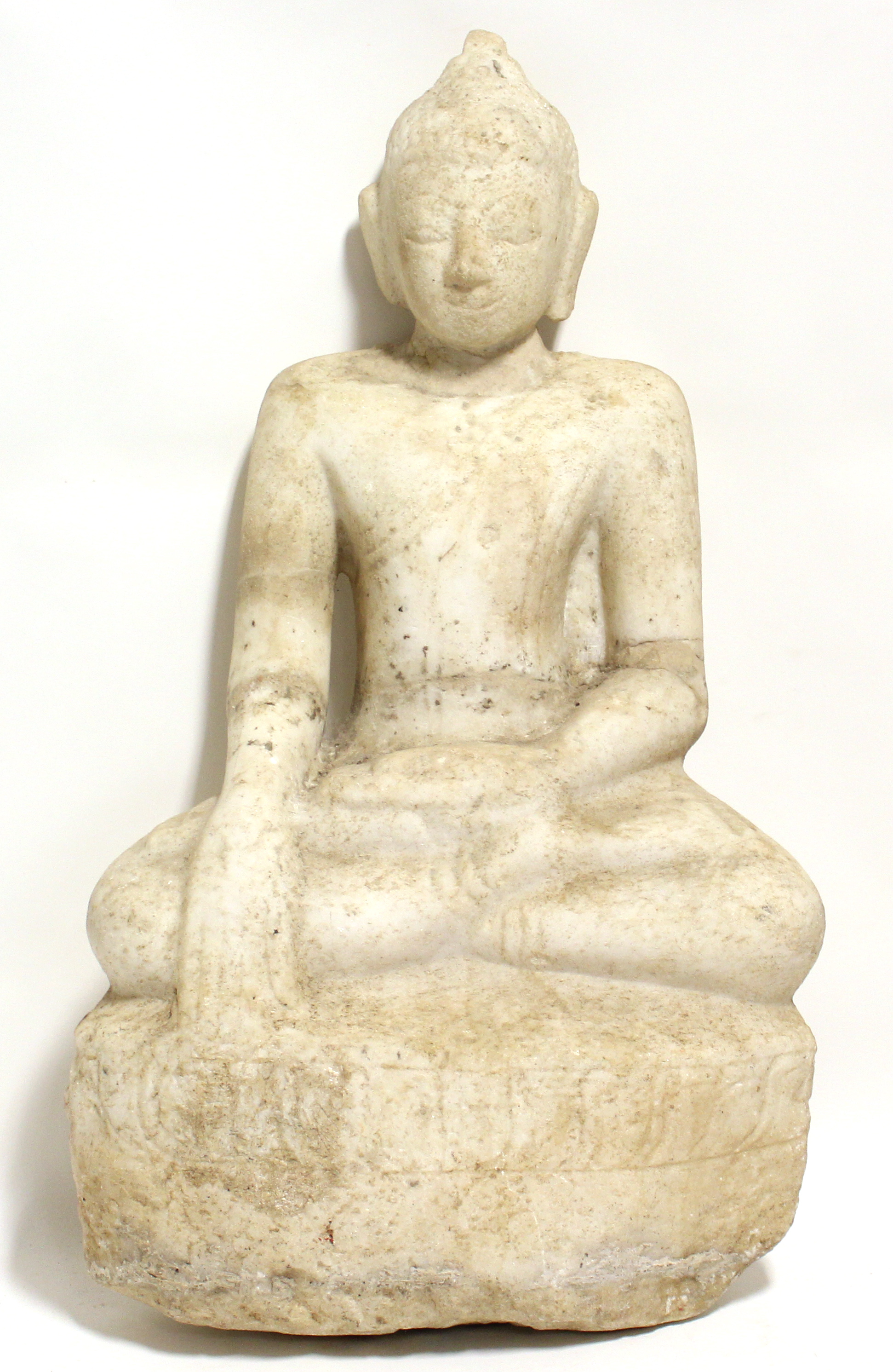 An Indian large sculptured white marble seated figure of the Buddha, 24¾” high (broken & re-stuck at