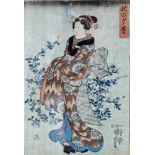 KUNIYOSHI (1798-1861) A 19th century Japanese woodcut depicting a Geisha in long flowing robes, 13¾”