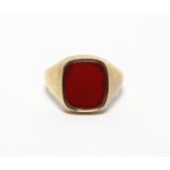 A 9ct. gold gent’s signet ring set oblong carnelian matrix (vacant); Birmingham hallmarks for