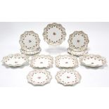 A late 19th century Royal Doulton porcelain thirteen piece part dessert service, with gilt floral