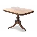 A late Regency mahogany breakfast table of small proportions, the rectangular tilt-top with