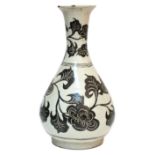 A Chinese Cizhou stoneware yuhuchunping decorated with trailing peonies in dark brown & sgraffito on