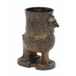 A CHINESE BRONZE ARCHAISTIC PHOENIX VESSEL, the bird supporting a cylindrical vase on its back, with