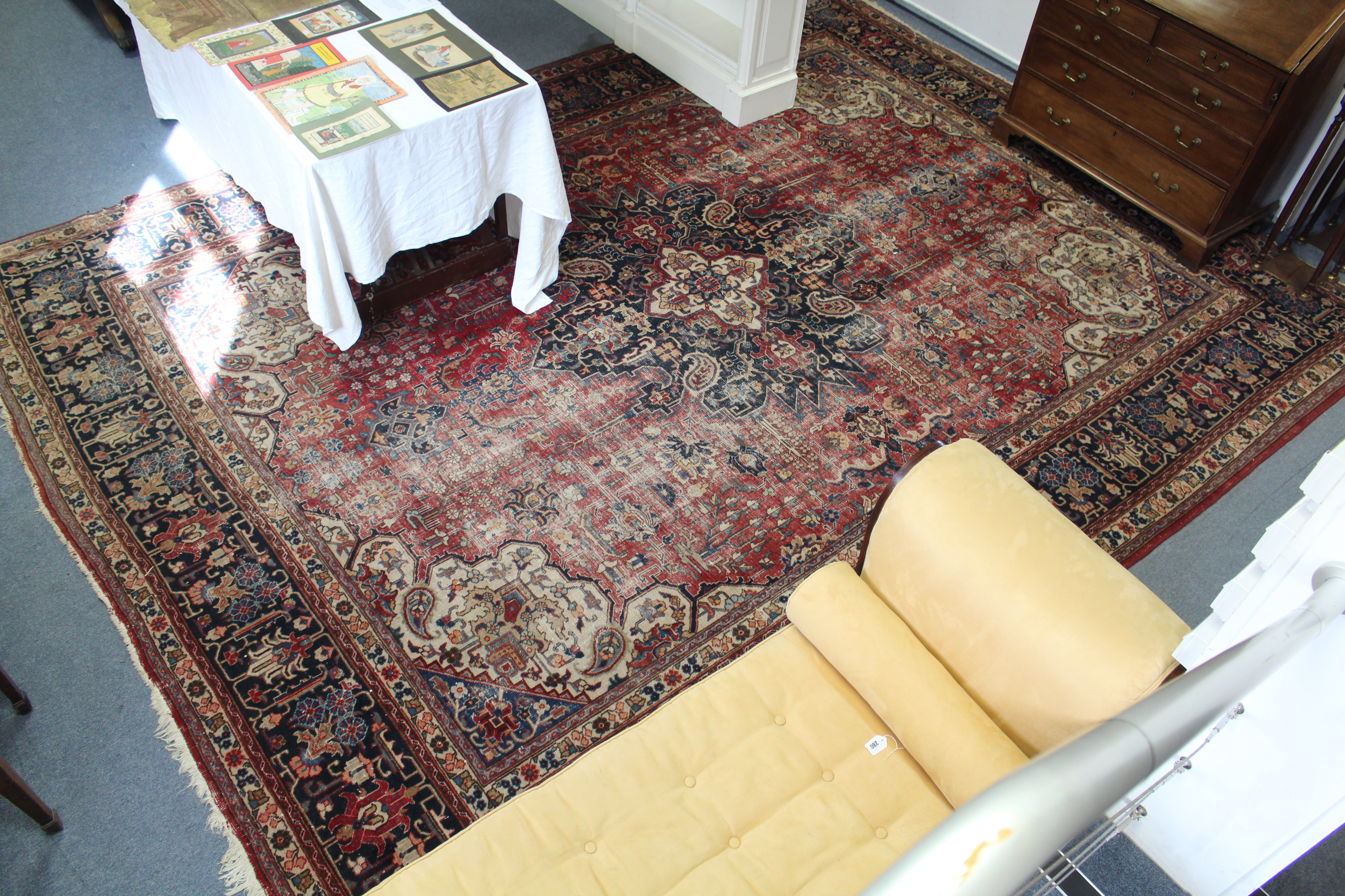 An antique Persian carpet of crimson, deep blue & ivory ground, with central medallion surrounded by - Image 2 of 2