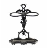 A Victorian cast-iron umbrella stand of fruiting vine design; 18½” wide x 25½” high.