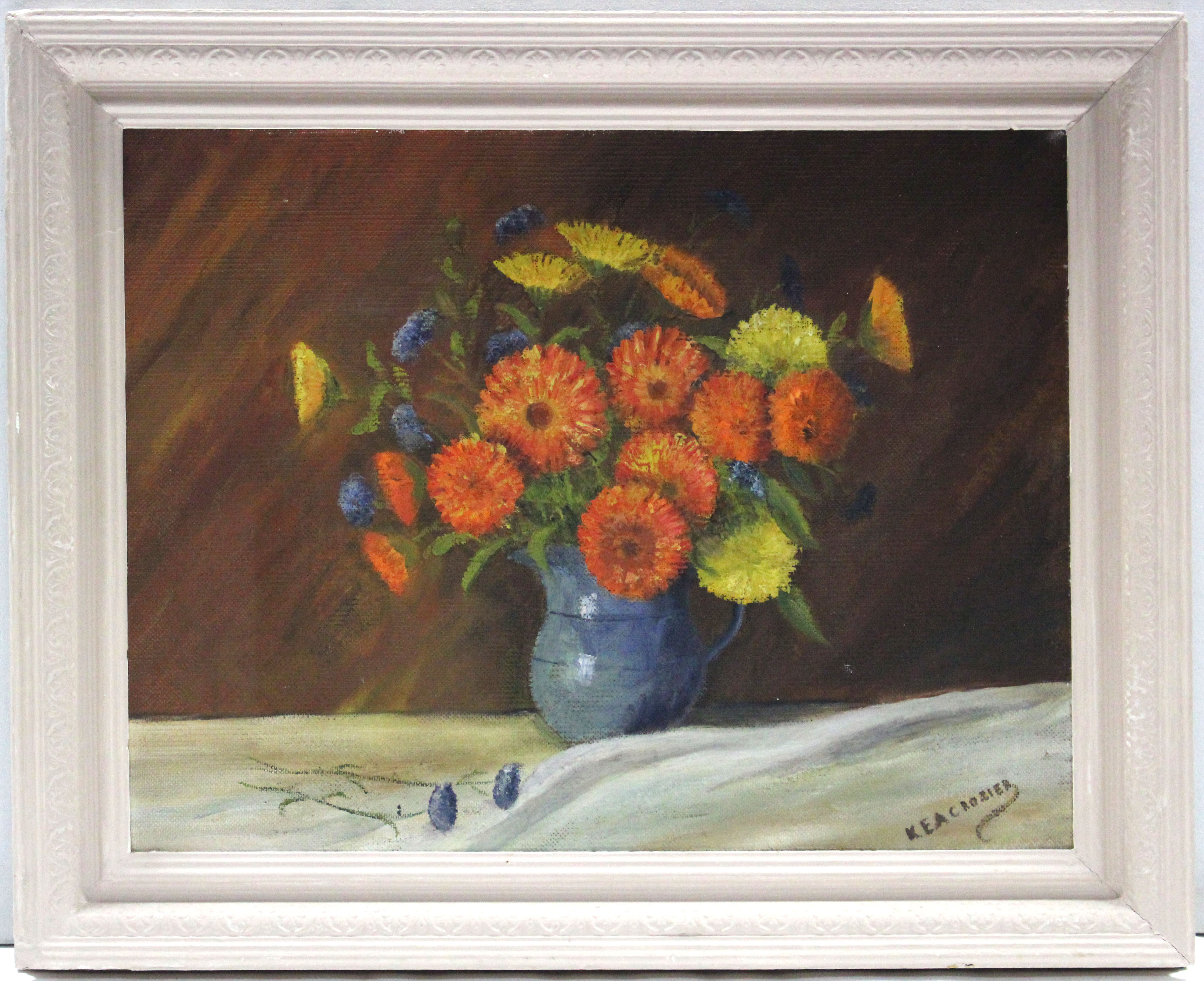 K.E.A. CROZIER (early/mid 20th century). A still life study titled “Marigolds”. Signed; oil on