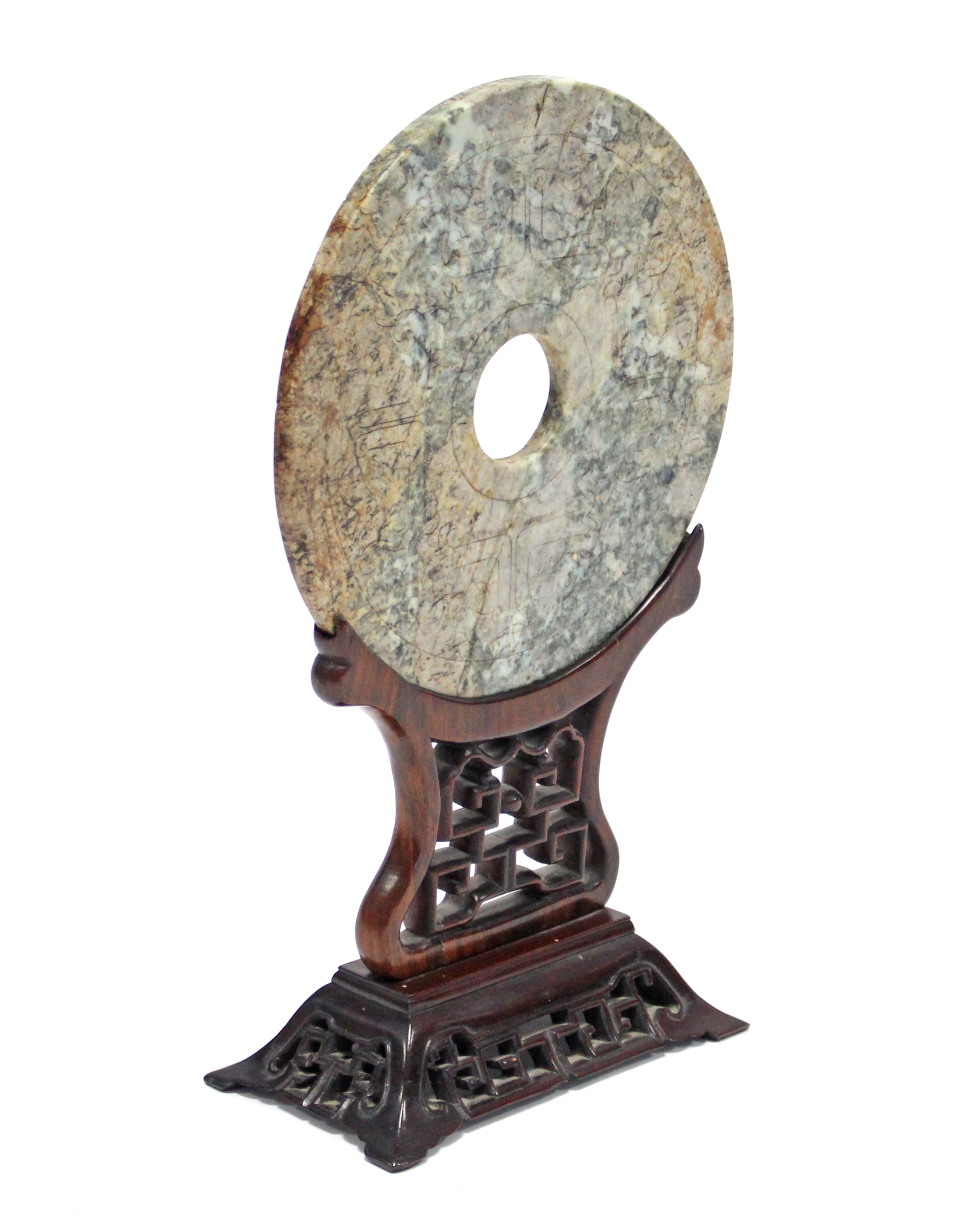 A CHINESE ARCHAISTIC CARVED JADE DISC (BI), the stone of mottled green, russet, & grey tone, the - Image 2 of 3