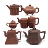 A group of six various Chinese Yixing teapots, one with removable infuser.