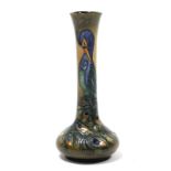 A Moorcroft pottery “Peacock” vase, designed by Rachel Bishop, with tall cylindrical neck on a squat