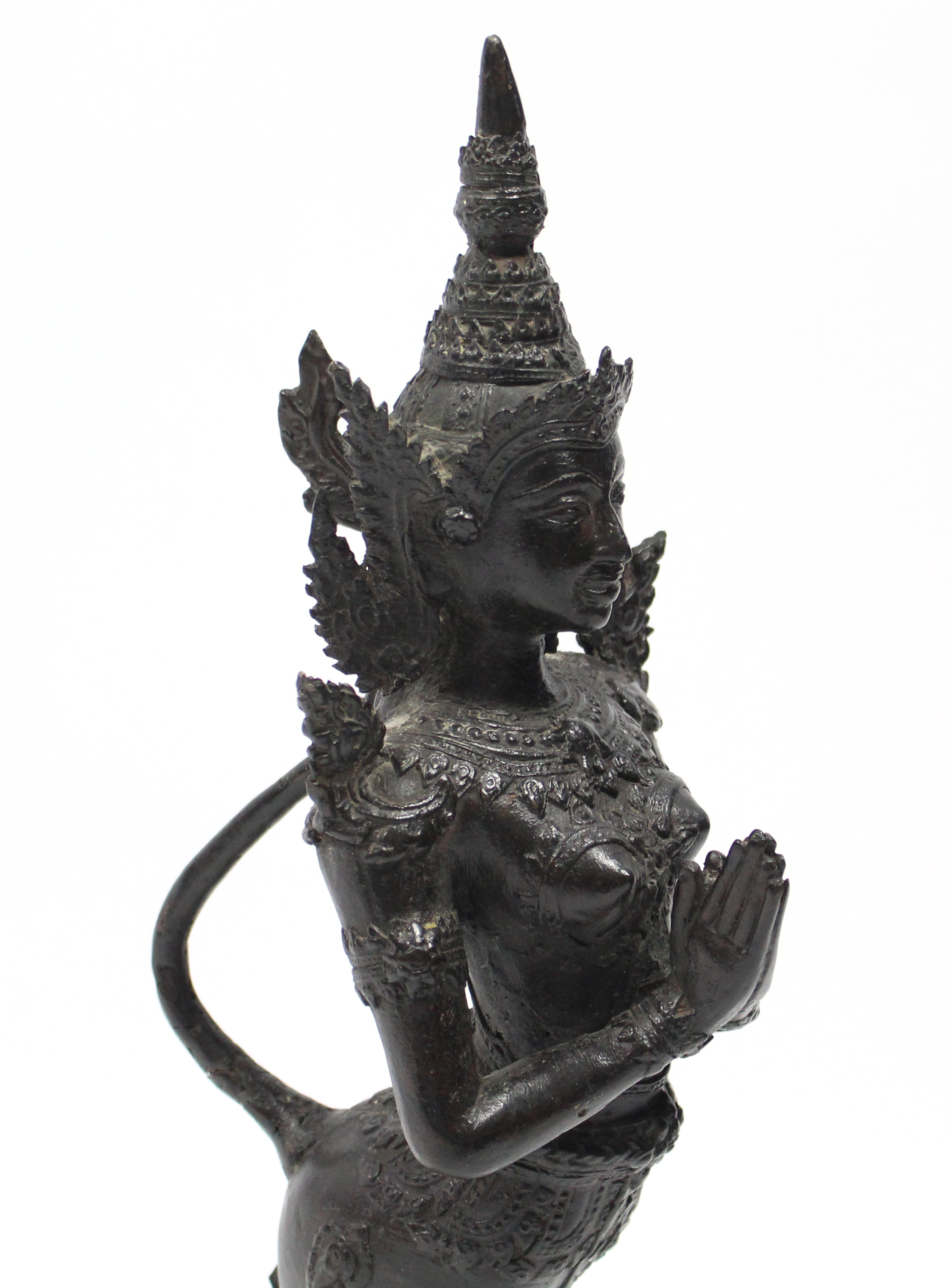 A Thai bronze standing figure of Kinnara with hands in prayer; 15¾” high, on wooden block base. - Image 2 of 5