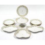 A late 19th century Limoges porcelain floral dinner service comprising seven 8” diam. plates, a pair