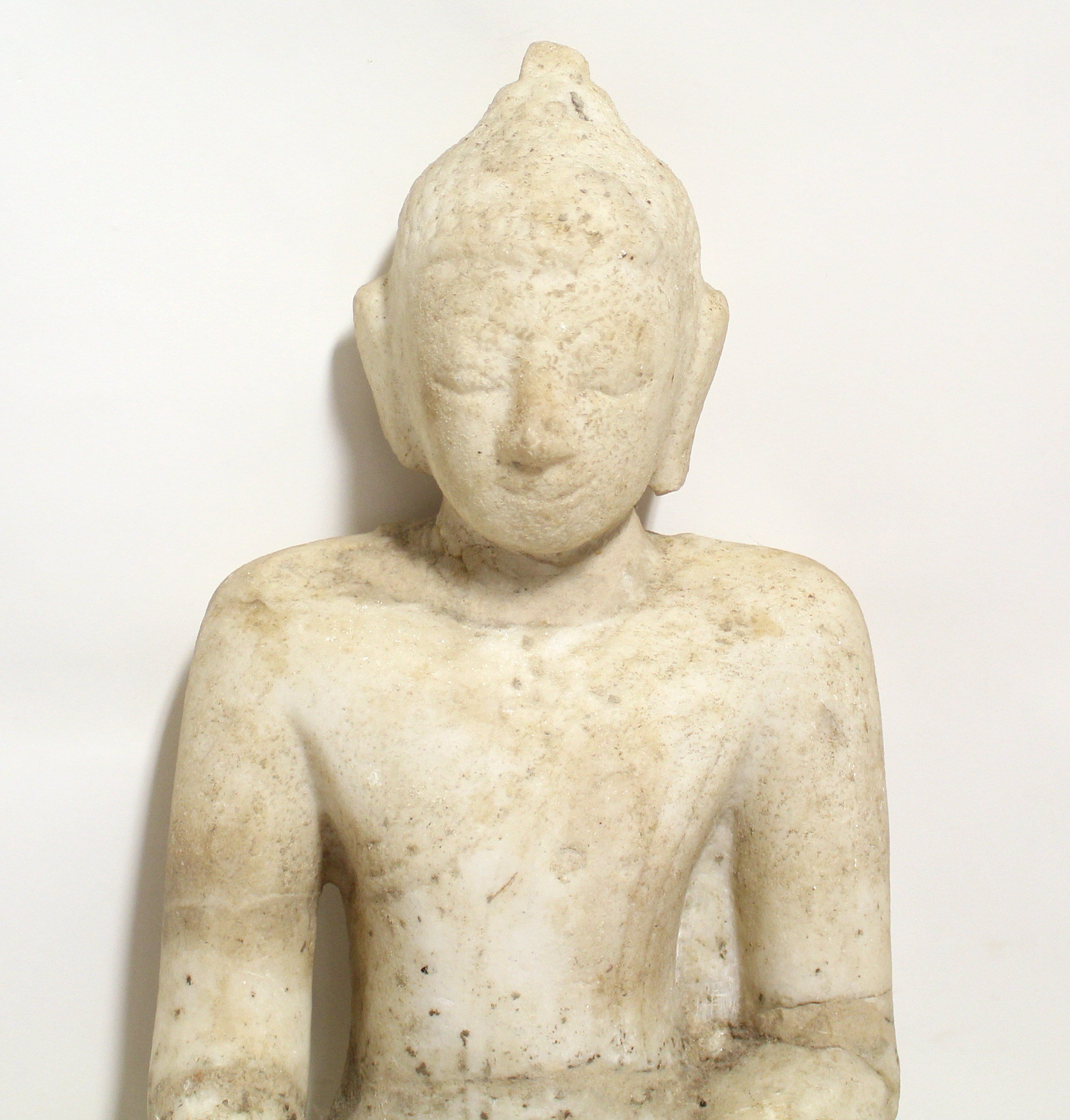 An Indian large sculptured white marble seated figure of the Buddha, 24¾” high (broken & re-stuck at - Image 3 of 4