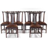 A set of six Chippendale-style mahogany dining chairs with shaped & reeded splat backs & padded