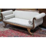 A REGENCY ROSEWOOD & BRASS LINE-INLAID SOFA, with applied rosettes to the scroll arms, loose cushion
