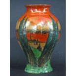 A Royal Worcester Crown Ware lustre vase of baluster form, decorated with an eastern landscape in