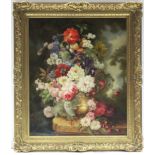 ENGLISH SCHOOL, late 19th/early 20th century. A still-life study of a vase of flowers perched on a